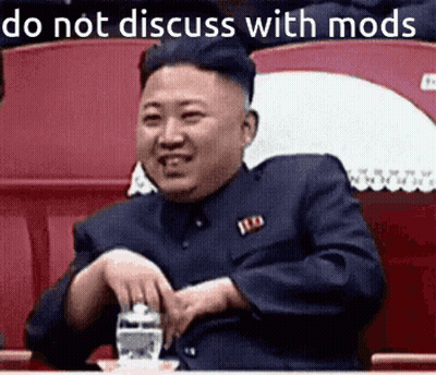 Man In Suit Sitting In Stadium Saying Do Not Discuss With Mods GIF