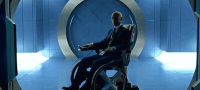 Man In Suit Sitting In Wheelchair GIF