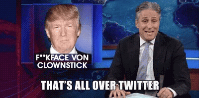 Man In Suit Sitting Next To Donald Trump GIF