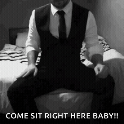 Man In Suit Sitting On Bed Come Sit Baby GIF