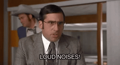Man In Suit Sitting On Couch GIF