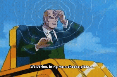 Man In Suit Sitting On Yellow Vehicle GIF