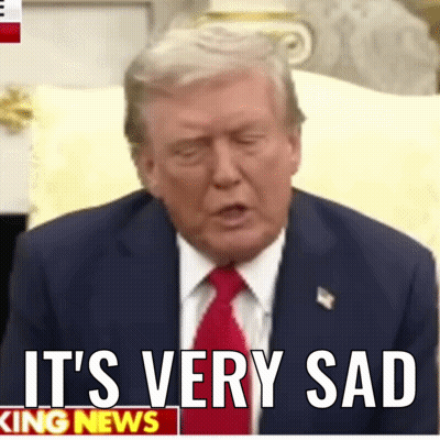 Man In Suit Sitting Says Very Sad GIF
