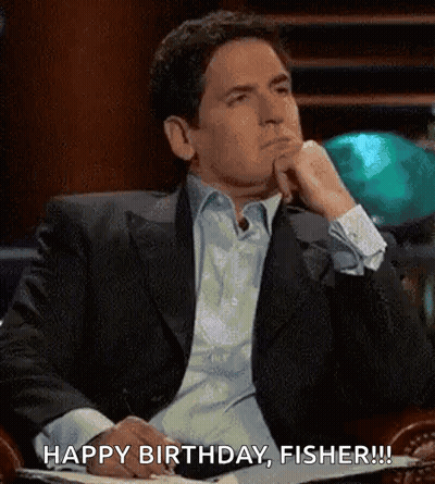 Man In Suit Sitting With Hand On Chin Saying Happy Birthday Fisher GIF