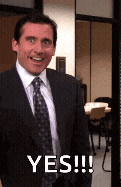 Man In Suit Smiling And Saying Yes GIF