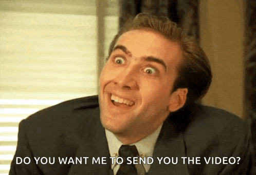Man In Suit Smiling Asking Send Video GIF