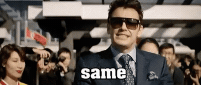 Man In Suit Smiling At Crowd With Sunglasses GIF