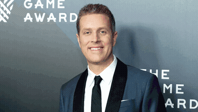 Man In Suit Smiling At Game Award GIF