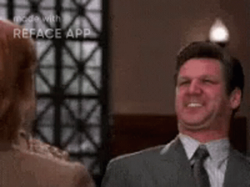 Man In Suit Smiling At Woman GIF