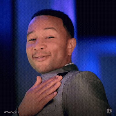 Man In Suit Smiling Hand To Chest GIF