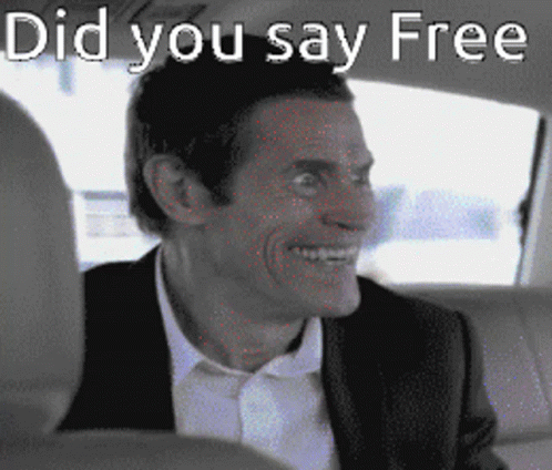 Man In Suit Smiling In Car GIF