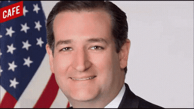 Man In Suit Smiling In Front Of American Flag With Cafe GIF