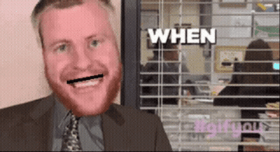 Man In Suit Smiling In Front Of Window Saying When GIF