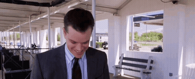 Man In Suit Smiling Looking Down GIF