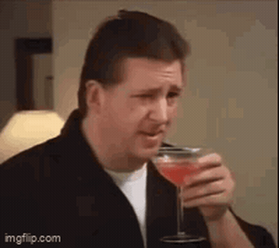 Man In Suit Smiling Making Face GIF