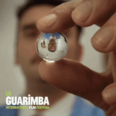 Man In Suit Smiling Next To Young Boy GIF
