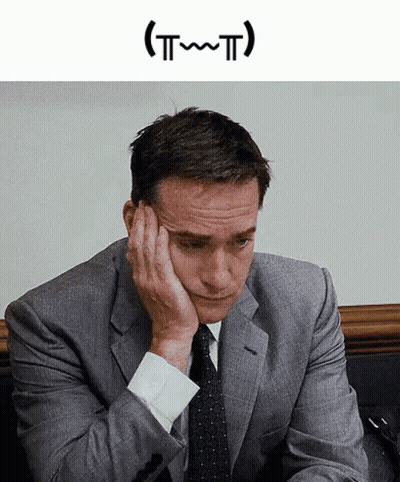 Man In Suit Smiling On Cell Phone GIF