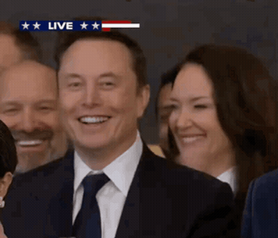 Man In Suit Smiling On Live Broadcast GIF