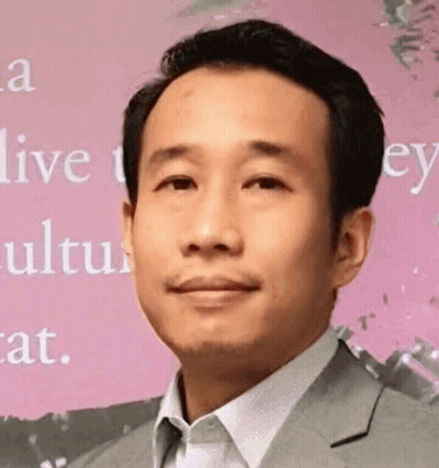 Man In Suit Smiling On Pink Saying Live GIF