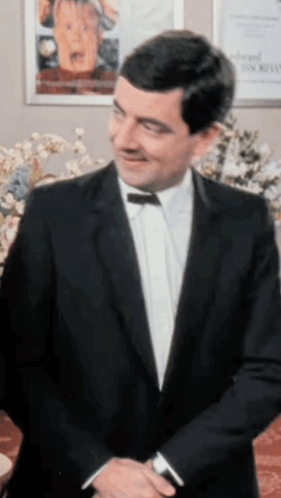 Man In Suit Smiling GIF