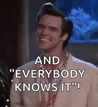 Man In Suit Smiling Saying And Everybody Knows It GIF