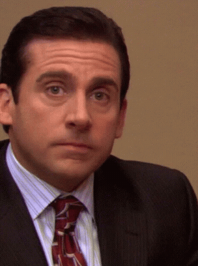 Man In Suit Smiling Saying HR Violation GIF