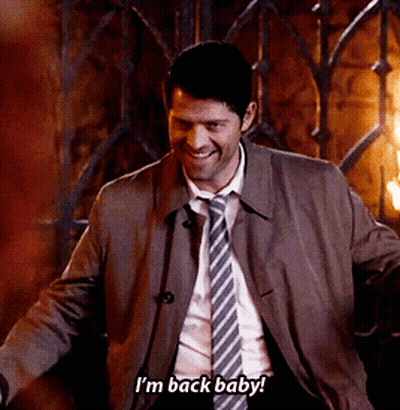 Man In Suit Smiling Saying I'm Back Baby GIF