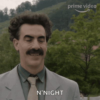 Man In Suit Smiling Saying N'Night GIF