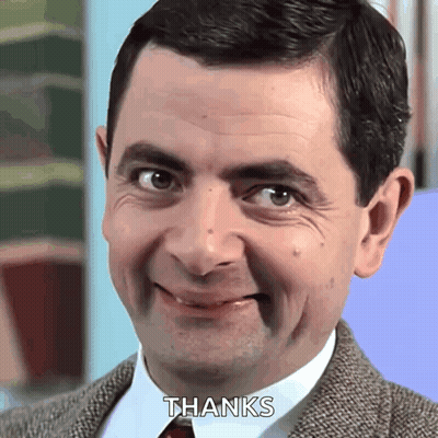 Man In Suit Smiling Saying Thanks GIF