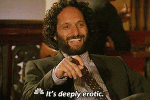Man In Suit Smiling Says It's Deeply Erotic GIF