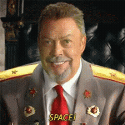 Man In Suit Smiling Says Space GIF