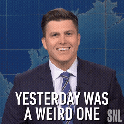 Man In Suit Smiling Says Yesterday Was A Weird One GIF