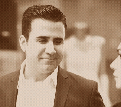 Man In Suit Smiling Sepia Photo GIF