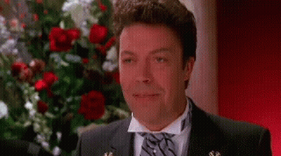 Man In Suit Smiling With Eyes Closed GIF