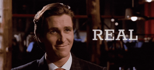 Man In Suit Smiling With Real GIF