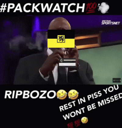 Man In Suit Smoking Behind Yellow Flag GIF