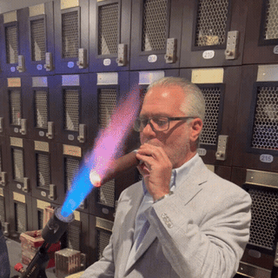 Man In Suit Smoking Cigar By Lockers 213 GIF