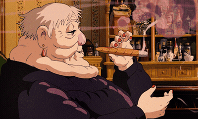 Man In Suit Smoking Cigar On TV Saying Yesilkom GIF