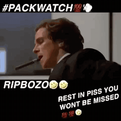 Man In Suit Smoking Cigar Rest In Piss GIF