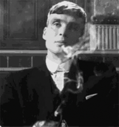 Man In Suit Smoking Cigarette Black And White GIF