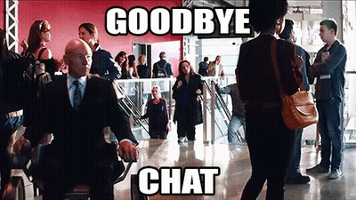 Man In Suit Smoking Cigarette In Front Of EOI Sign GIF