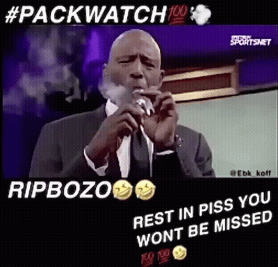 Man In Suit Smoking Cigarette Says RIP Bozo GIF