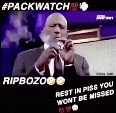 Man In Suit Smoking Cigarette Singing Into Microphone GIF