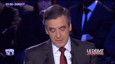 Man In Suit Speaking Into Microphone Alors Dis-Moi GIF