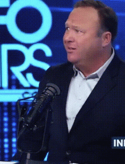 Man In Suit Speaking Into Microphone At Fox News GIF