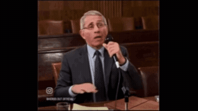 Man In Suit Speaking Into Microphone Saying Fiif Anything GIF