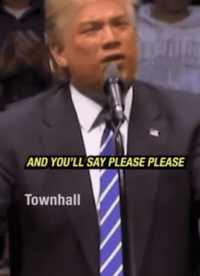 Man In Suit Speaking Into Microphone Saying Please Please Townhall GIF