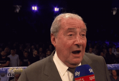 Man In Suit Speaking Into Sky Sports Microphone GIF