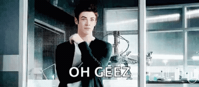 Man In Suit Standing At Window Saying Oh Geez GIF
