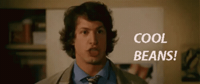 Man In Suit Standing Before Cool Beans Poster GIF